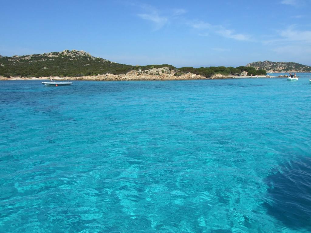 Budelli’s natural pools are a route possibility, subject to wind and park permissions.